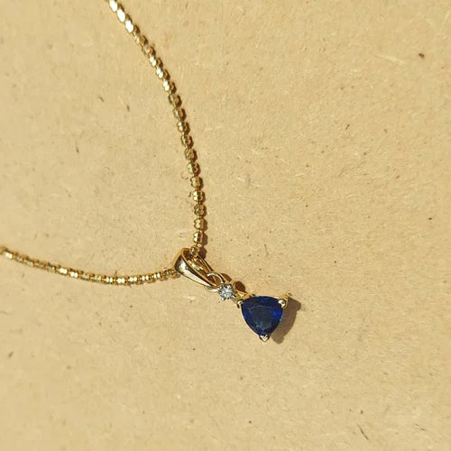Bold Trillion Blue Sapphire & Diamond Pendant in 18K Gold – A Statement of Royal Grace