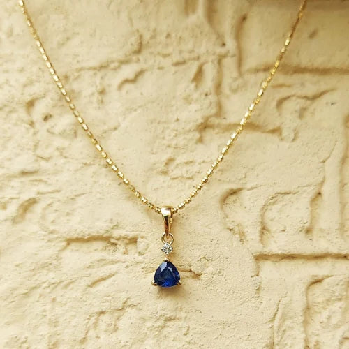 Bold Trillion Blue Sapphire & Diamond Pendant in 18K Gold – A Statement of Royal Grace