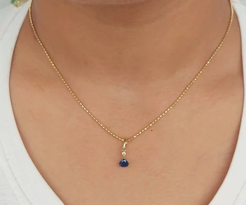 Bold Trillion Blue Sapphire & Diamond Pendant in 18K Gold – A Statement of Royal Grace
